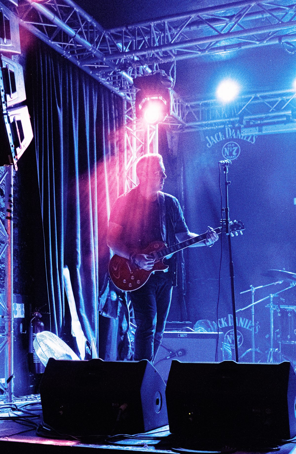 Live music event photographer Newcastle — neon stage performance
